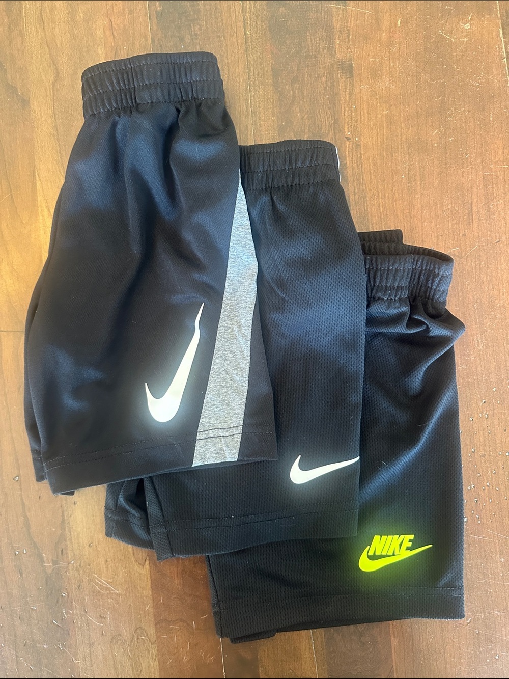 Nike Kids Black Shorts with White Swoosh and Neon Yellow Logo